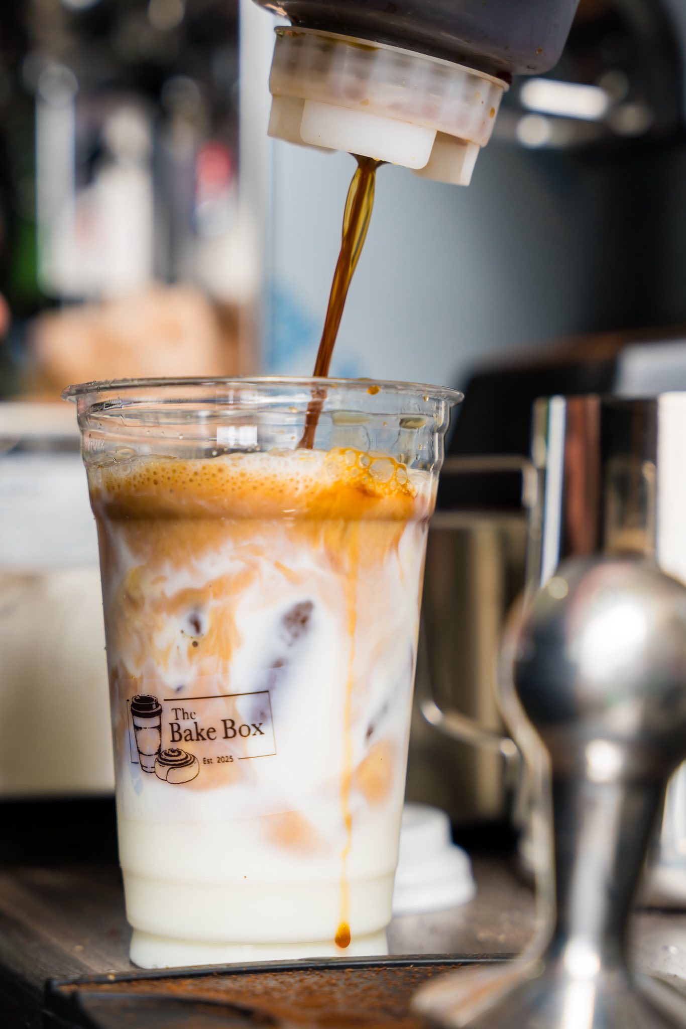 Coffee drink being poured at The Bake Box